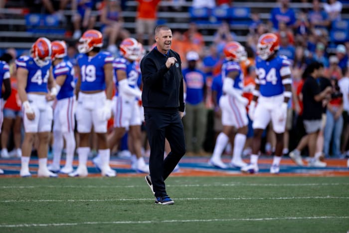 Florida Gators head coach Billy Napier cheers before the game.